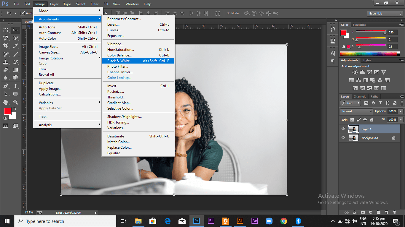 Selecting the "black and white" option from the image and adjustments drop-down menu
